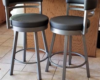 Gray bar stools. There are 3 of them.