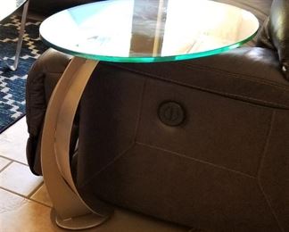 Modern glass and metal C tables on rollers. There are a set of 2.