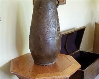 Large pottery vase and wood side table