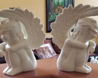 White ceramic angels to watch over you.