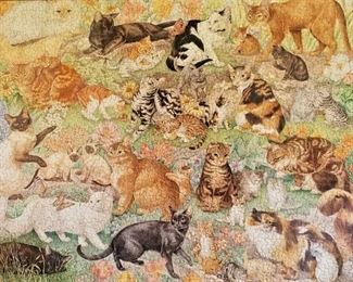 Cat art made from a large puzzle.