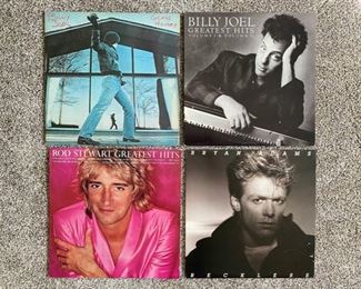 Selection of vintage vinyl records including Queen, Rolling Stones, The Who and Billy Joel