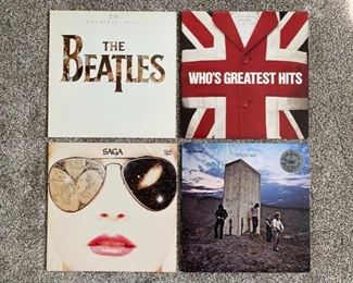 Selection of vintage vinyl records including Queen, Rolling Stones, The Who and Billy Joel