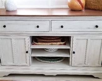 Matching buffet server for the kitchen/dining whitewashed distressed set. This server/buffet has sides that pull out for extra serving.