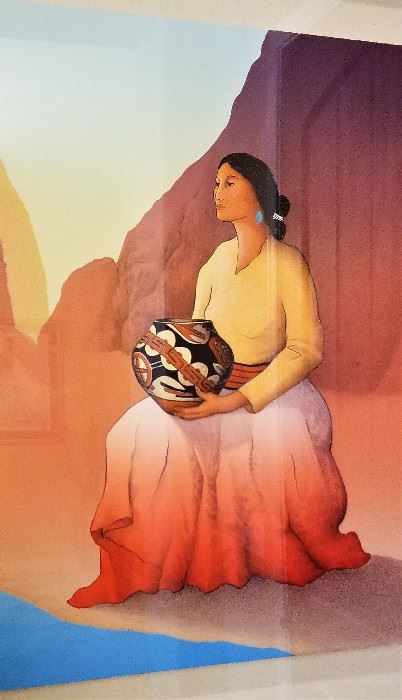 R.C. Gorman art of a Native American woman holding a piece of pottery  is floating in a shadowbox frame. 