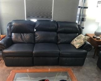 Leather recliner great shape no tears no stains etc. Headrests recline as well. There are two of them.