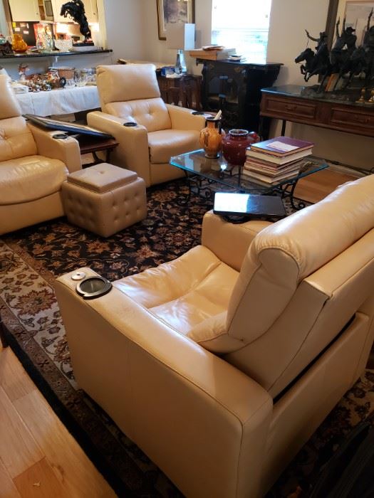4 Creme Leather Palliser Vox Theater Chairs-Electric Recliners. Lighted cup holders and eating trays.   $700 ea LIKE NEW
