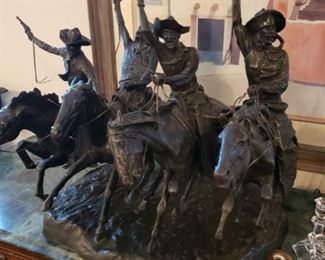 Stunning highly detailed Frederick Remington bronze "Coming through the Rye" 26" high 20" wide weighing about 150 lbs.  $4,000