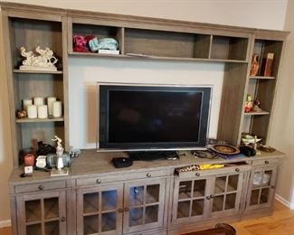 Like new Pottery Barn Livingston 7pc Entertainment Center. Will fit the largest flatscreen on the market. This is still carried by Pottery Barn and is almost $6,000. Our price $2,000
