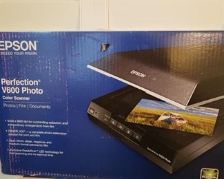  New in box Epson  Color Scanner- Google this- Scans film negatives and photos and documents. $150