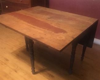 Early primitive gateleg drop leaf table