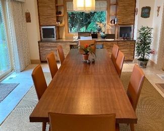 CASE table with 8 FRAG chairs handmade  in Italy.   This  table has 2 self storing leaves and 8 
chairs.  Two arm and 6 side chairs.
Table measures:
35 1/2” wide
(2) 18 1/2” leaves 
78” long with no leaves 
Fully extended  with both leaves 115” in total length 
PERFECT CONDITION