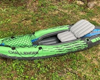 The Intex Challenger™ K1 Kayak is sporty and fun with a streamlined design for easy paddling. The bright green color and sporty graphics make the kayak highly visible in the water. Great for experiencing lakes and mild rivers solo, this Sports Series kayak is perfect for one adult. Lightweight and compact, this kayak is very easy to assemble and, with the Boston valve, it inflates and deflates in minutes. You can take the fun of kayaking wherever you go.

Made with rugged vinyl construction and built for performance, this sturdy kayak has an inflatable I-beam floor, a low-profile deck and high-buoyancy side chambers for stability, comfort and function. A removable skeg provides exceptional directional movement, while an adjustable, inflatable seat with a backrest is included for comfortable seating. A grab line at each end is provided for your convenience, as well as a cargo net for extra storage, a NMMA certified U.S. Coast Guard I.D., and a repair patch kit. The Challenger™ K1 Kayak 