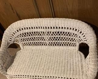 Charming, white wicker bench for children. This item is made from authentic wicker, and has no plastic or man made materials. Wooden beadwork alone back.
Perfect condition.
Dimensions 36Lx17Dx21H.