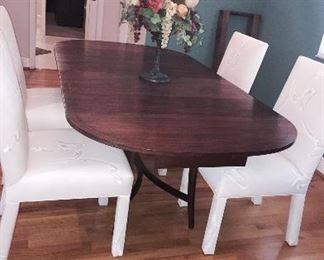 Vintage round solid wood table w/3 leaves! Table opens to Lg oval table.
Chairs are obtional