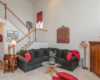 Green velvet three piece sectional...43" deep x 31" high x 55" long (each side)...center square is 42" square x 31" high. The round table pictured here is 24" diameter and 27" high.