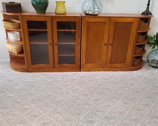 This is a sectional bookcase. The two rounded endcaps measure 14" from the center point to the end and have built in baskets, and the two center units...one visible storage and one with closed doors measure...34" wide 14" deep x 36.5" high
