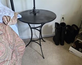 There are a pair of these metal bedside tables. Each table measures 21" in diameter x 35" high