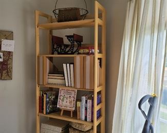 This tall shelving unit is collapsible when not in use. 5 shelves...28" wide x 12" deep x 76" tall