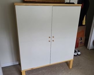 White two-door storage cabinet...37.5" wide x 47" high x 17" deep