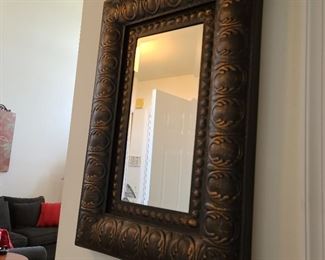 Pressed tin framed mirror...20.5" x 30"