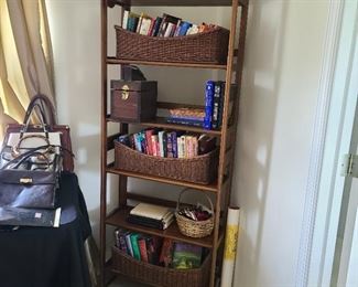This collapsible 6-shelf bookcase measures...74" tall x 12" deep x 28" wide