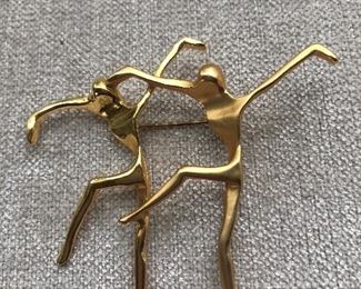 $22 Two figure gold tone pin 