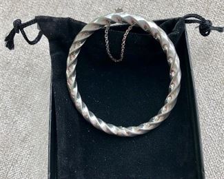 $30 Sterling silver twisty bangle 2 and 1/4 inches inside diameter. 