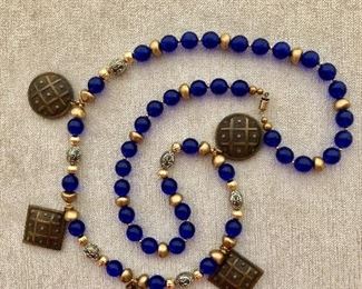 $ 35 Long blue stone necklace with medallions 