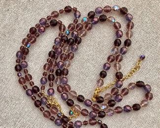 $30 Joan Rivers 2 long purple crystal necklaces plus attachable pendant  Box included