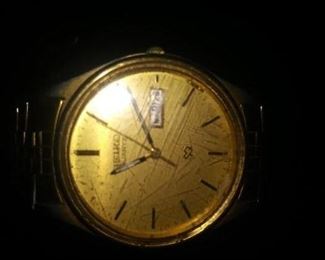 Seiko man's watch. Scratches on face.