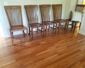 Oyster Cay Collection teak dining chairs.