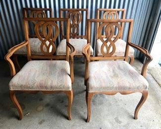 RomWeber chair set includes 2 arm chairs and 4 side chairs. Only 5 pictured. All that's needed is a fabric refresh. 