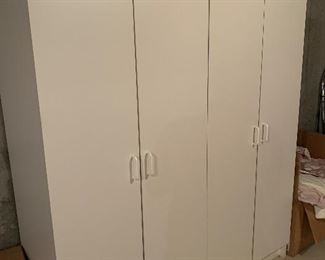 Two storage cabinets four doors 6feet by 40 inches