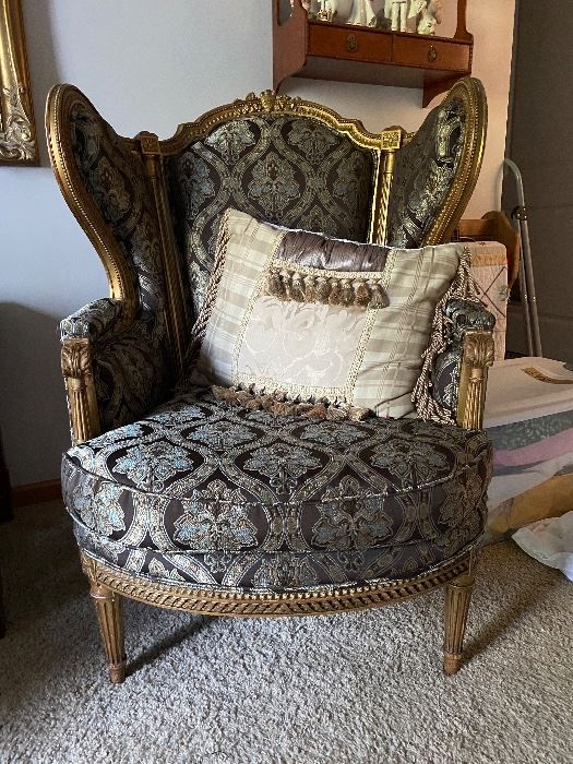 Antique wing back chair and throw pillow