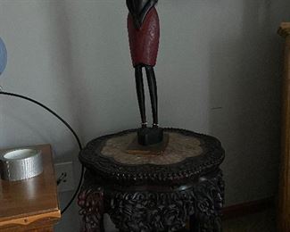 End table; African statue