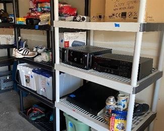 Computer, receiver, outdoor speaker set (never been used), shelf units, storage bins, men's golf shoes, games