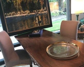 Beautiful oil painting of a fly fisherman by artist C. Kaye mid-century desk and a pair of chairs. Painting is $600.