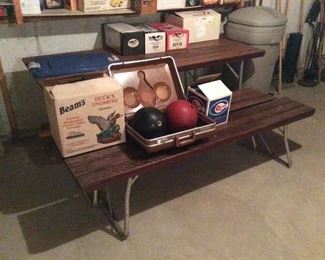Picnic table. Vintage bowling balls