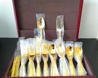 63 piece gold plated silverware**New**