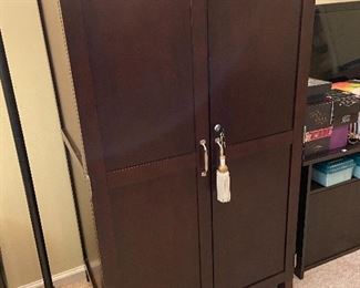Large cabinet that opens to