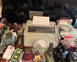 Electric Brother Typewriter, large Samsung flat screen TV.