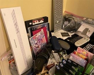 Key boards, printer ink, more office supplies. There's a VCR under there, too.