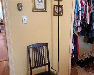 Folding chair, pole lamp.