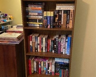 more religious books and book case.