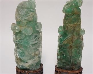 1008	PAIR OF ASIAN GREEN QUARTZ STATUES ON CARVED WOODEN BASES. 11 IN HIGH
