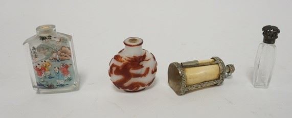 1009	4 SNUFF AND PERFUME BOTTLES. RED ON WHITE CAMEO SNUFF WITH DRAGONS-NO  TOP, INPAINTED SNUFF W/GLASS SURFACES- NO TOP, BONE AND METAL PERFUME AND A CUT GLASS PERFUME WITH ORIGINAL DABBER. TALLEST 3 IN
