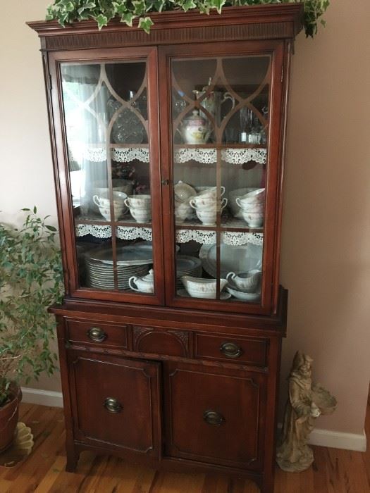 . . . a beautiful Duncan Pfyfe china cabinet filled with treasures