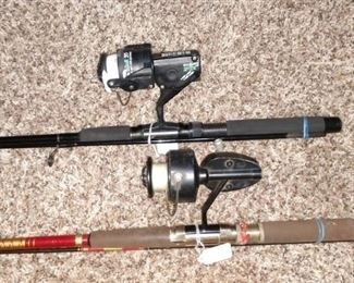 Back Bedroom Center:                                                            Fishing Poles: 1) New Wild Water Fly Rod AX56-090-4 w/Reel. 2) Olympic 3065FC w/Garcia Mitchell 300 reel. 