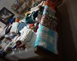 quilts, towels, sheets, blankets, pillows